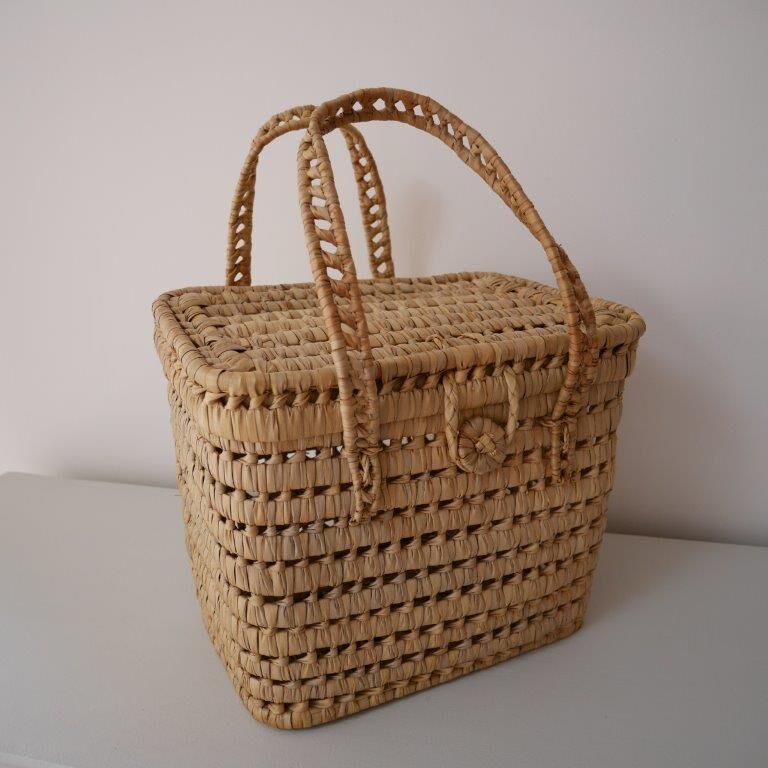 Basket made of woven palm leaves