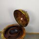 Meuble bar globe en bois sur roulette