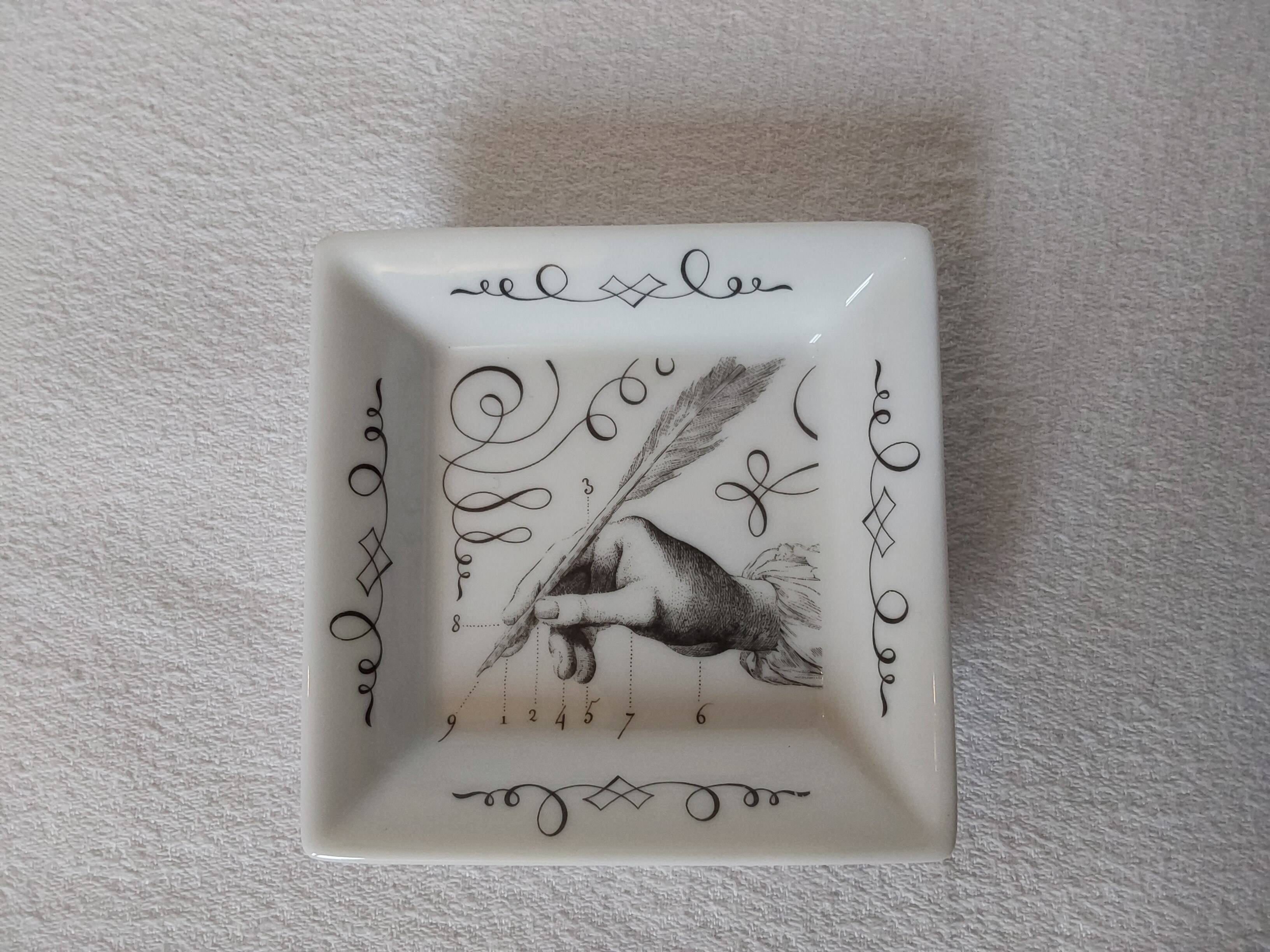 Mini Hermès pocket emptier