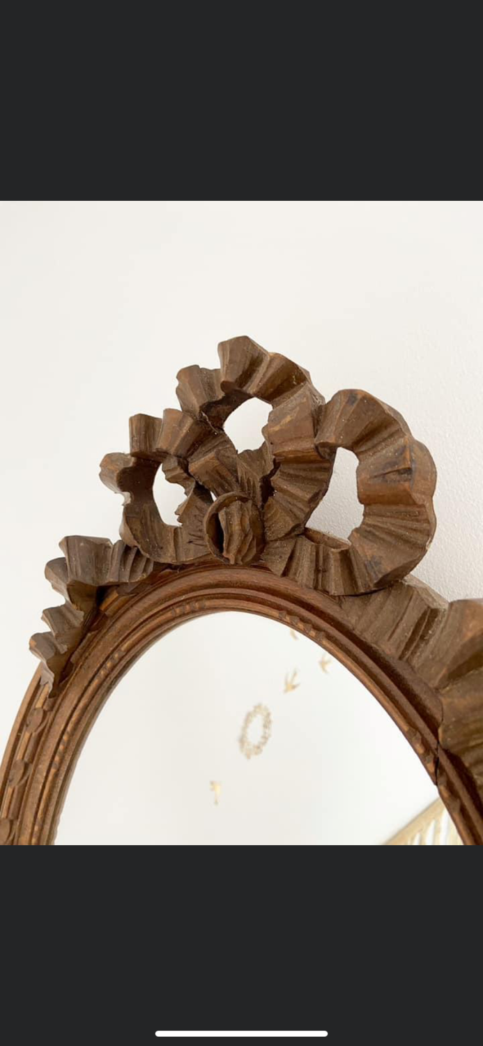 Louis XVI style oval knot mirror