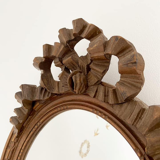 Louis XVI style oval knot mirror