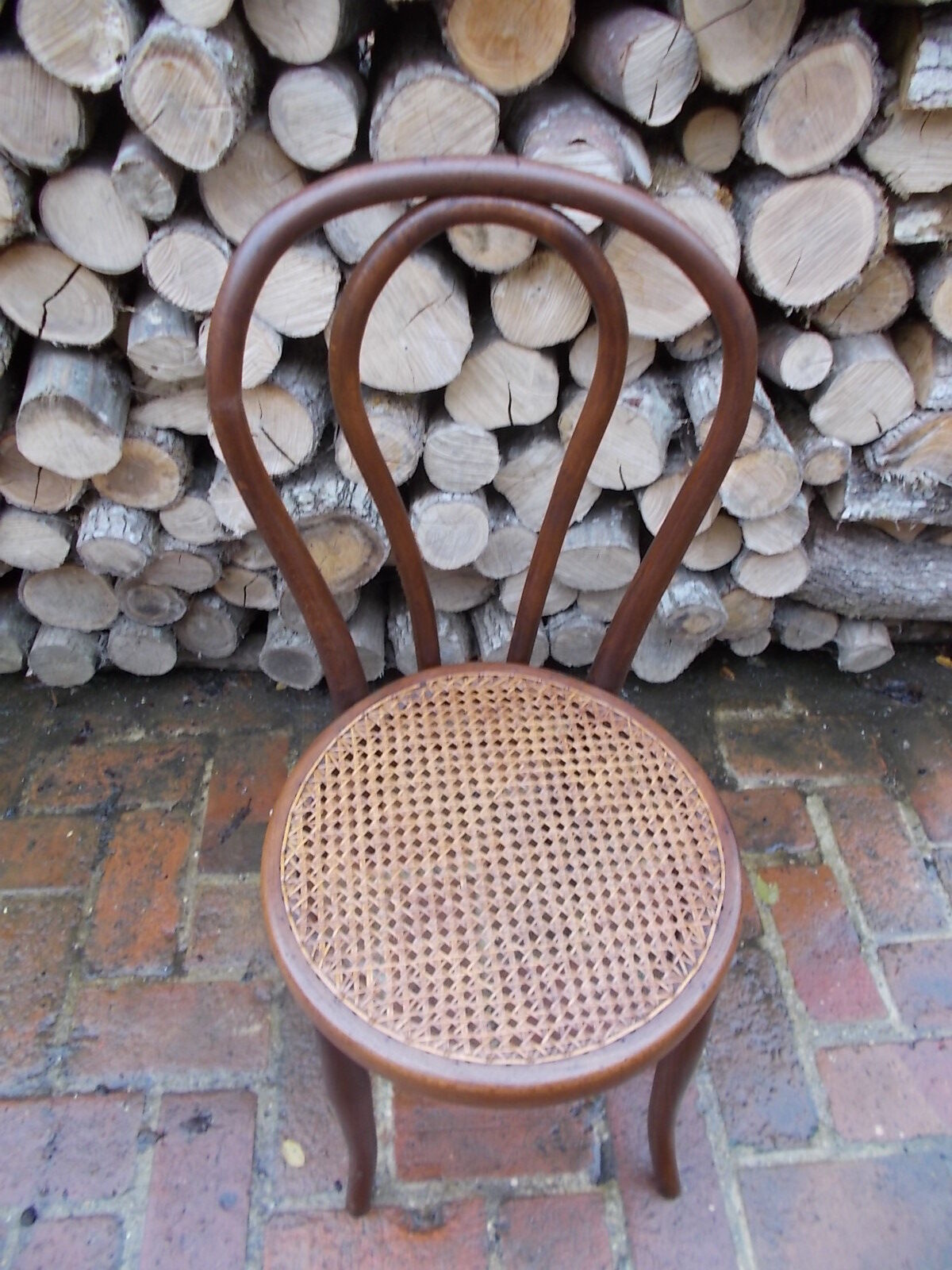 Curved wooden bistro chair and canning