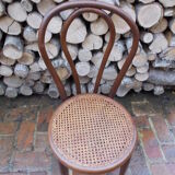 Curved wooden bistro chair and canning