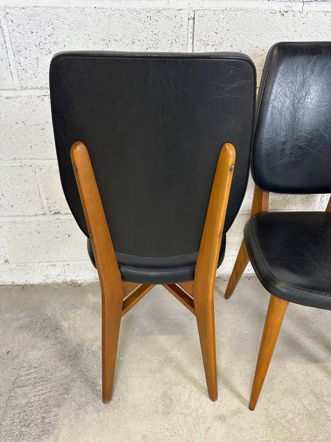 Set of 4 vintage chairs in black leatherette
