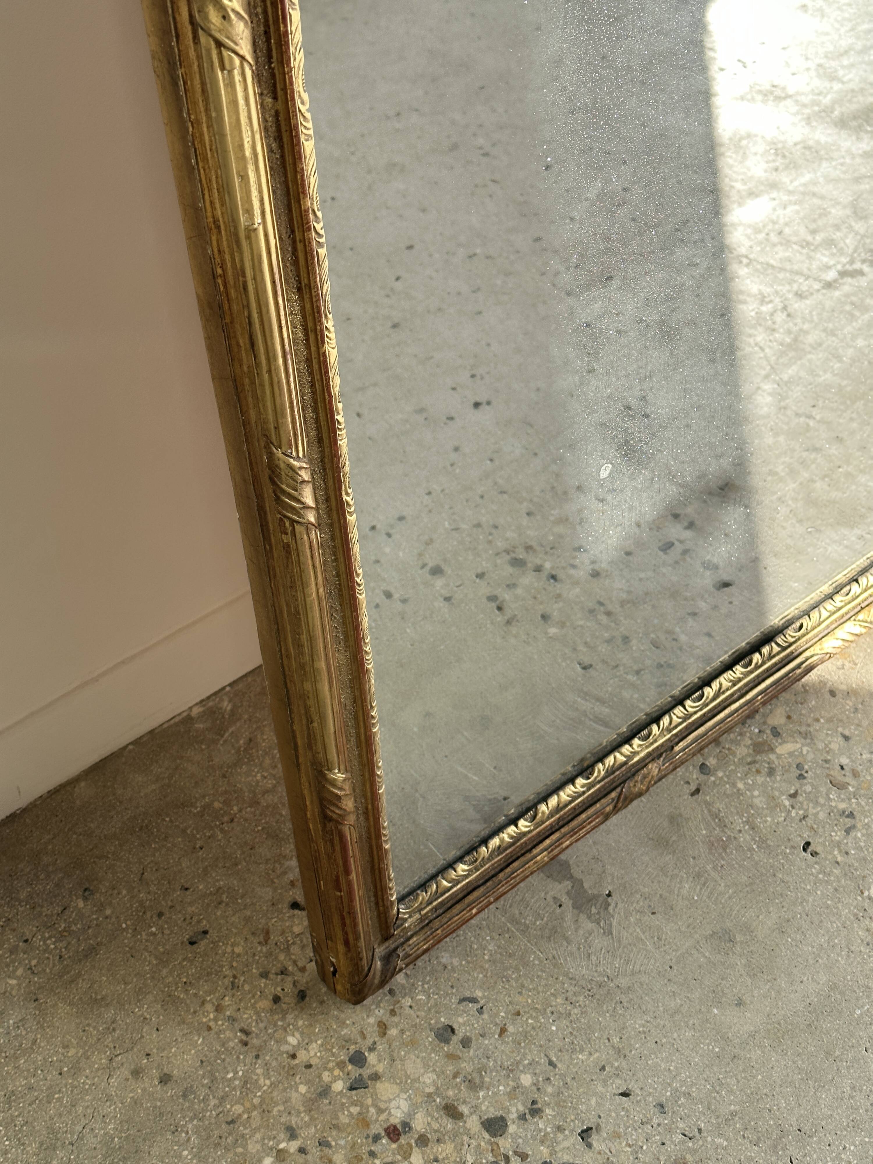 Large gilded mirror 19th century rounded corners mercury glass Louis XVI style