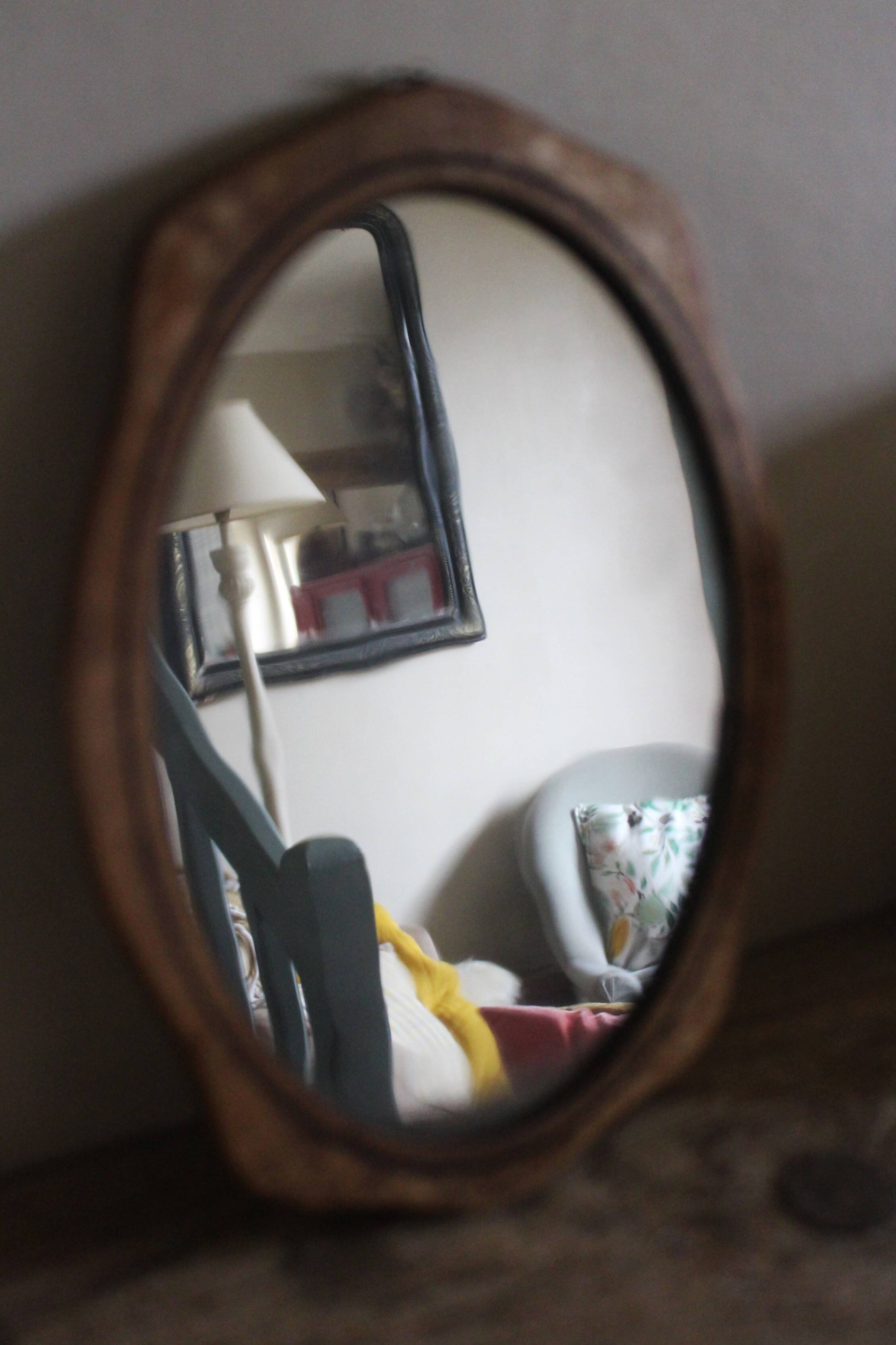 Small old wooden mirror