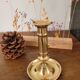 Push candle holder with hollow dish