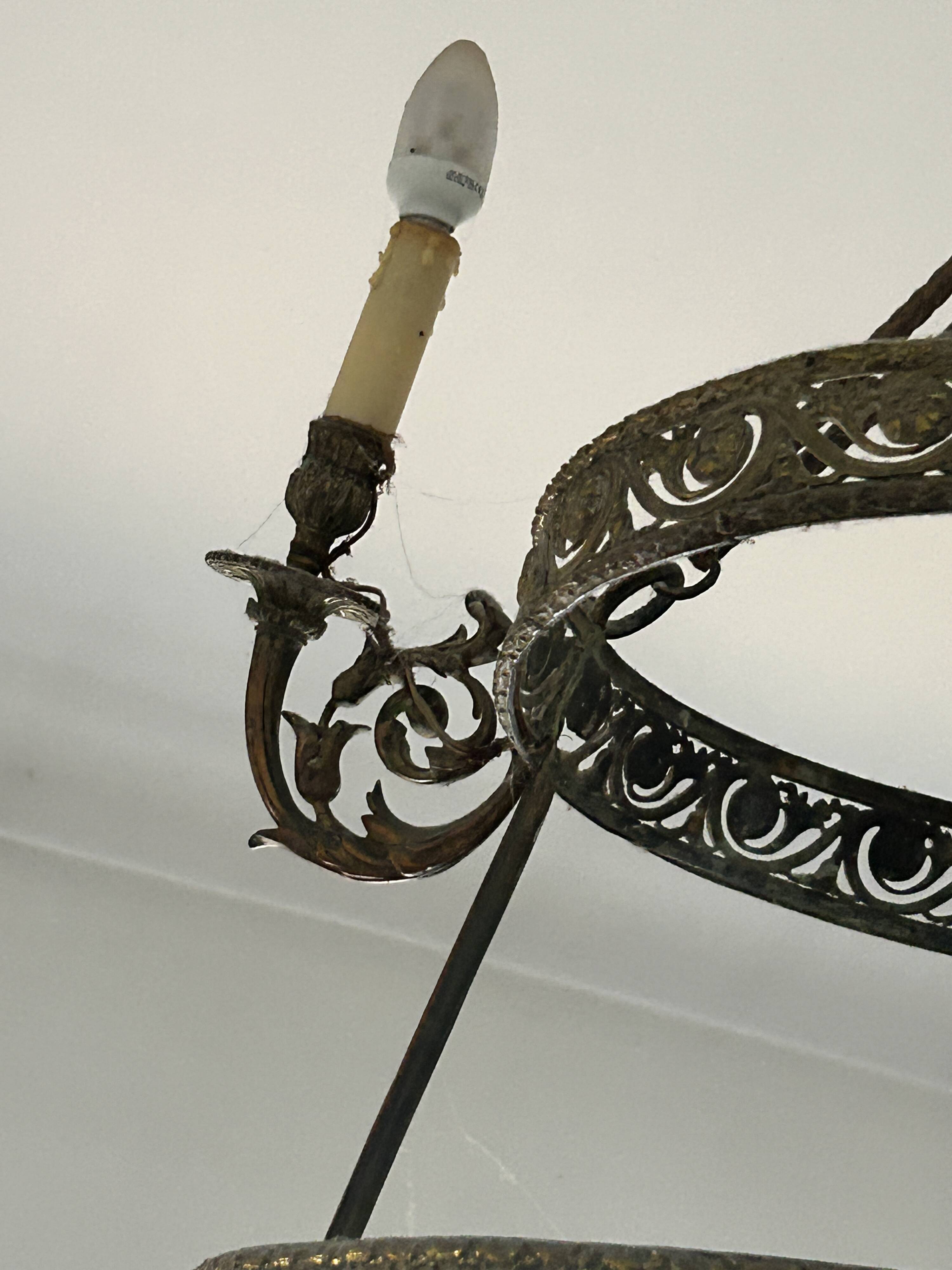 Brass chandelier from the early 20th century.