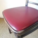 Set of 4 bistro chairs in curved wood and vintage red skai seats.