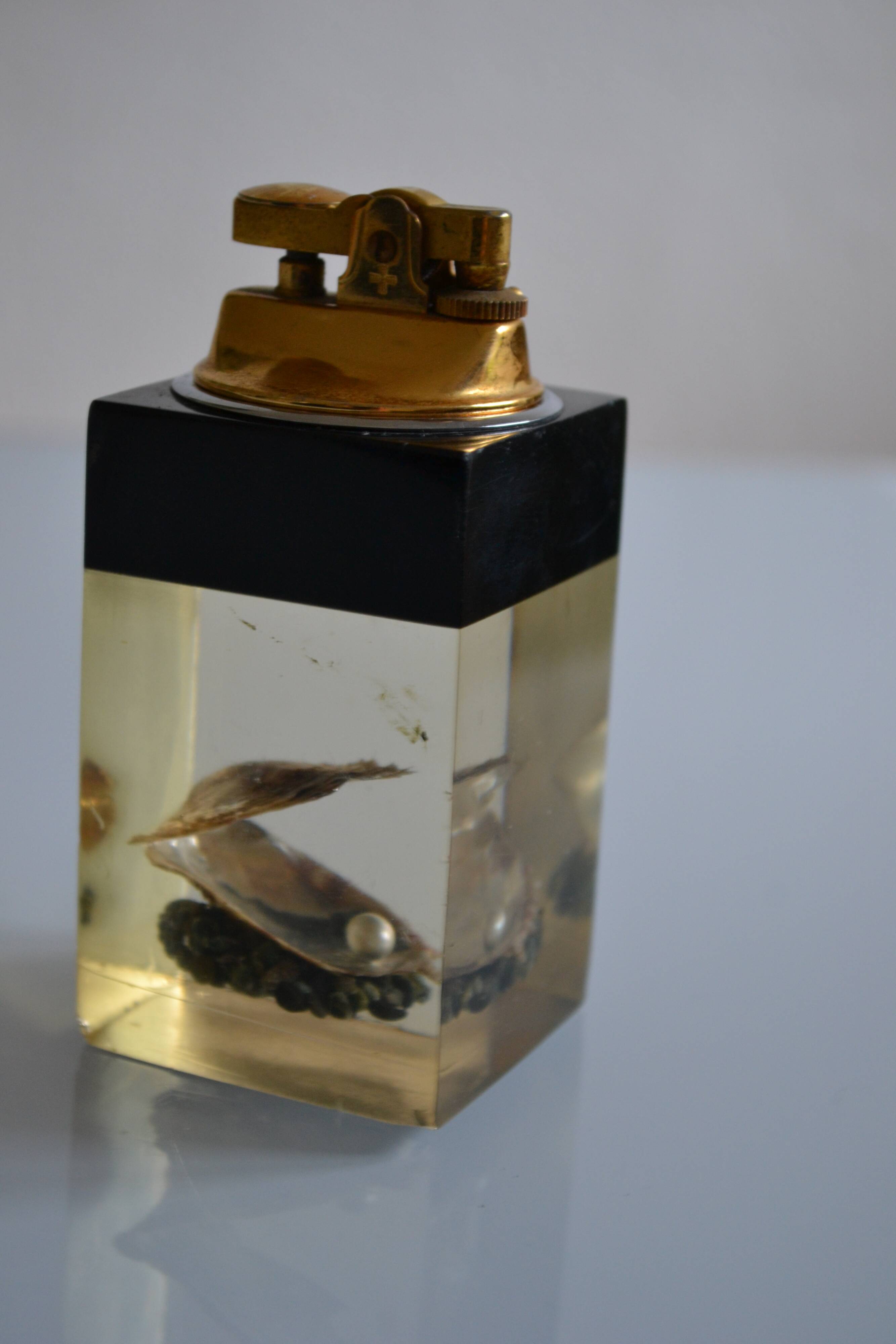 1970 Table lighter with pearl oyster in resin inclusion