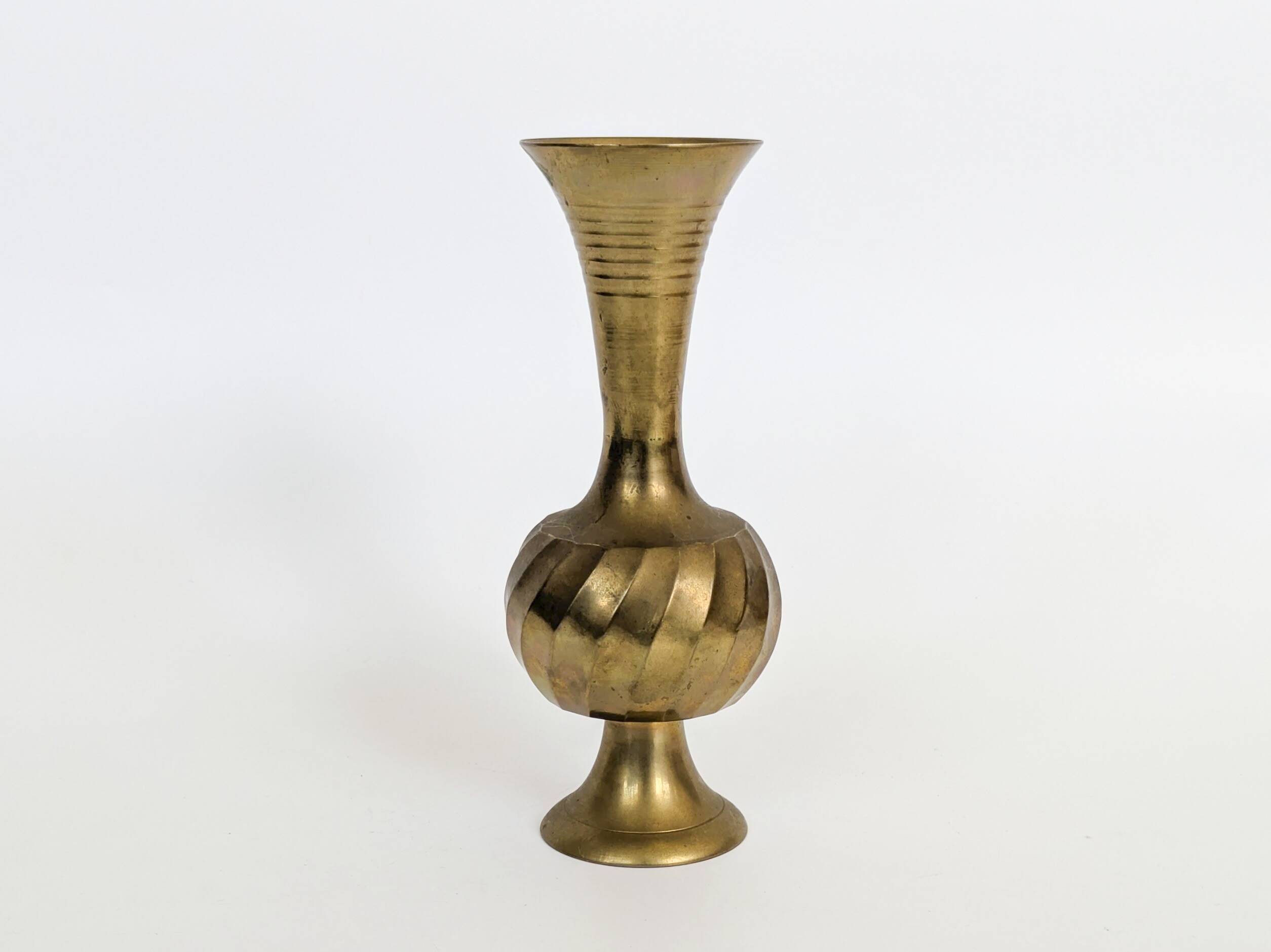 Solid brass Midcentury vase in trumpet shape with twisted details.
