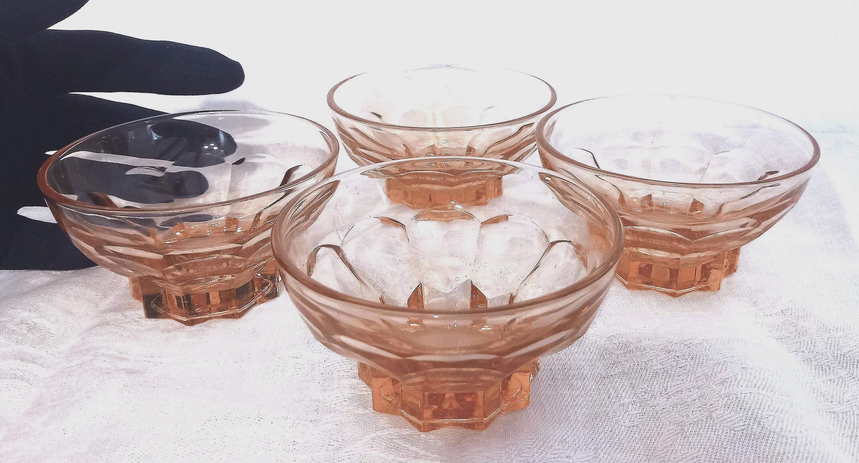 Set of 4 antique pink glass bowls