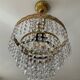 Chandelier with crystal and brass pendants