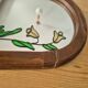 A pair of vintage stained glass style mirrors.