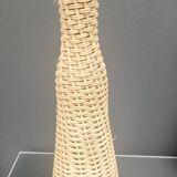 Glass and rattan bottle