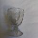 Molded glass egg cup with pigeon bird
