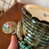 Pots in slurry flowers in relief