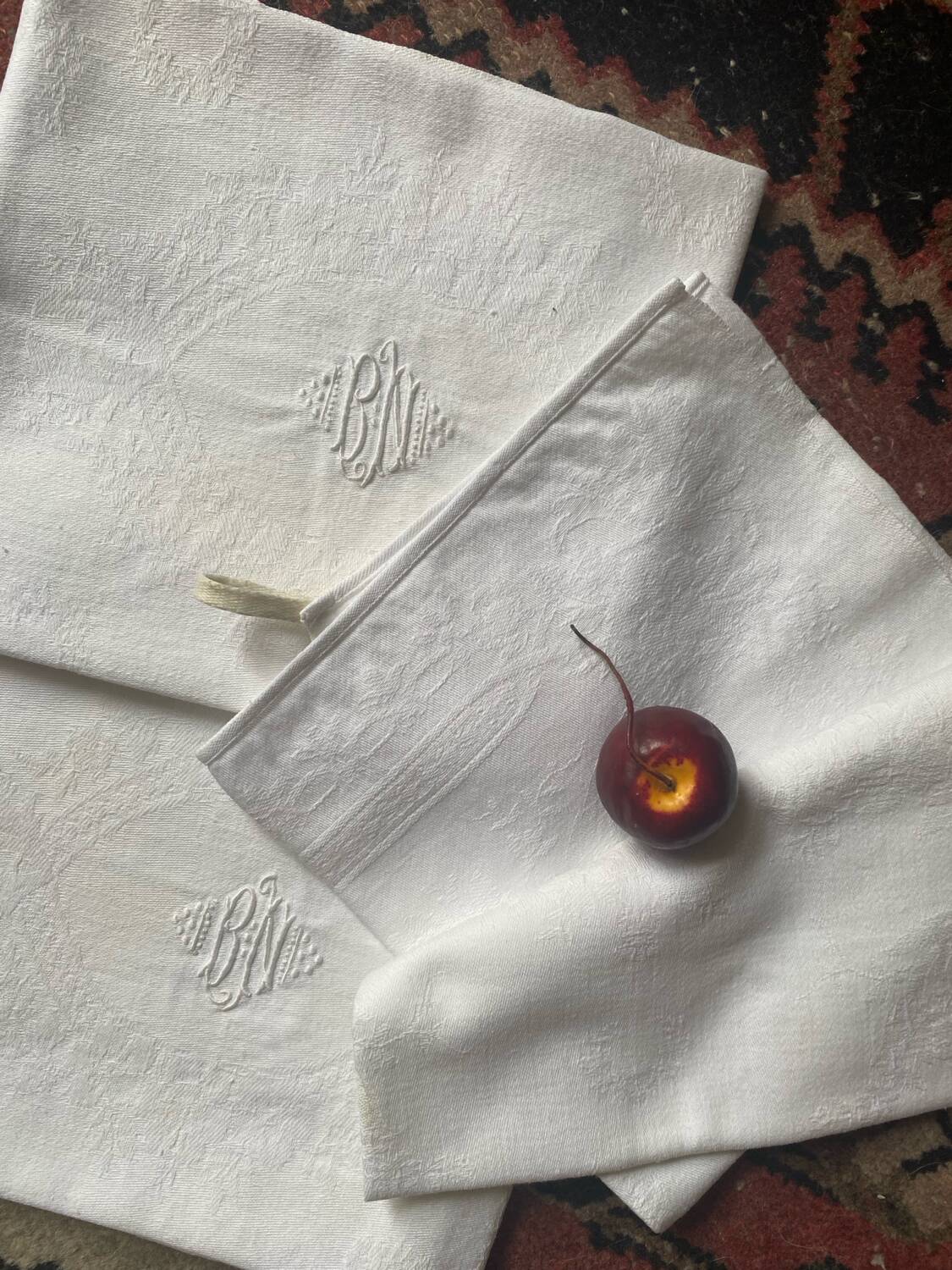 3 white tea towels in damask cotton thread with BN monogram.