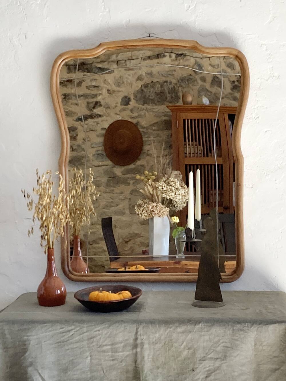 Art nouveau mirror, curved wooden frame and chiseled glass