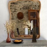 Art nouveau mirror, curved wooden frame and chiseled glass