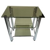 Smoked glass and chrome metal table with casters