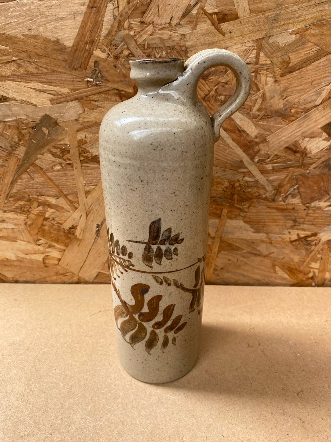 Antique beige enameled ceramic bottle vintage leaf decor
