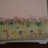 Underside of flat small flowers painted by hand