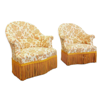 Paire de fauteuils style crapaud vintage en tissu fleuri à franges des années 50 60