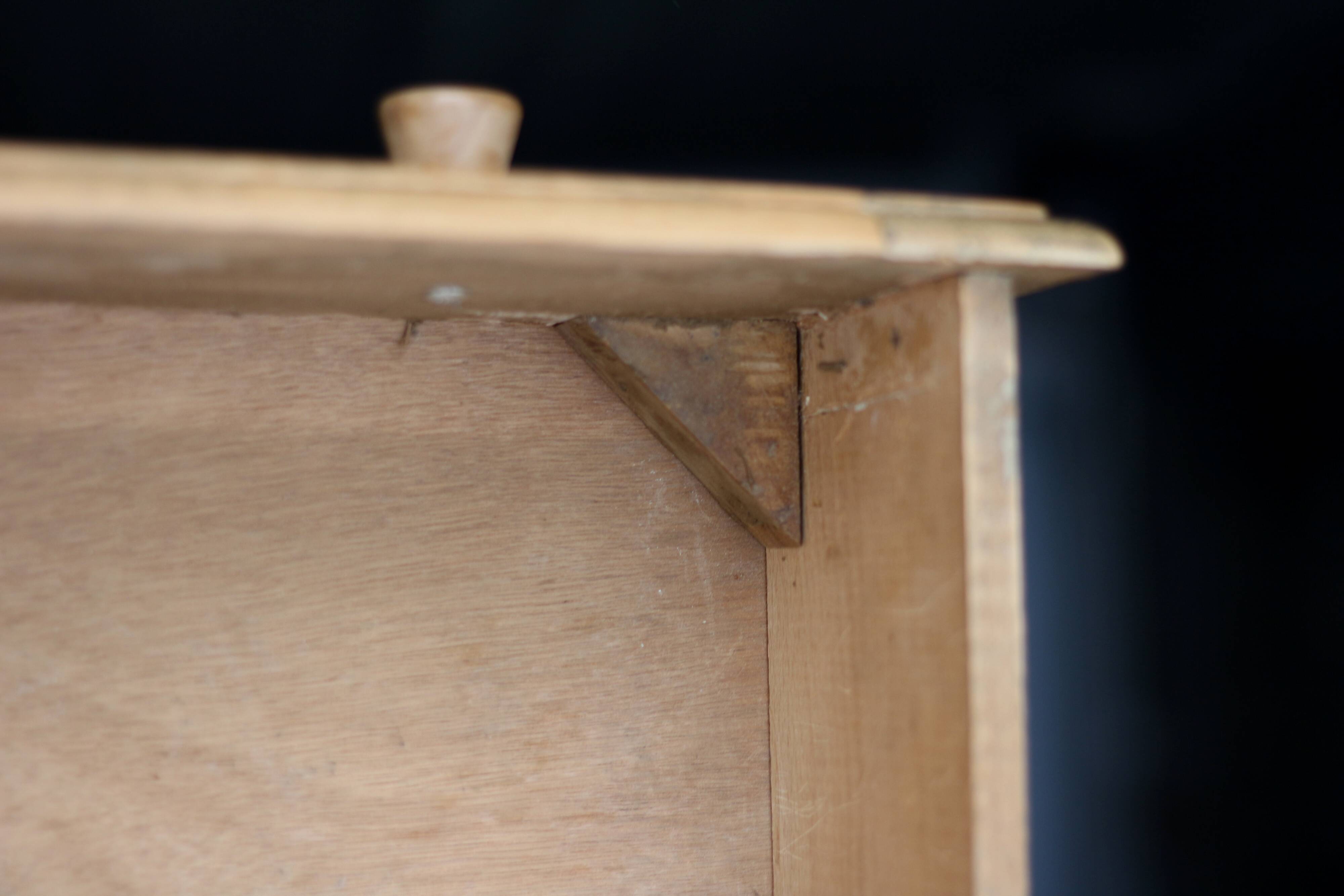 Small art deco chest of drawers in natural wood