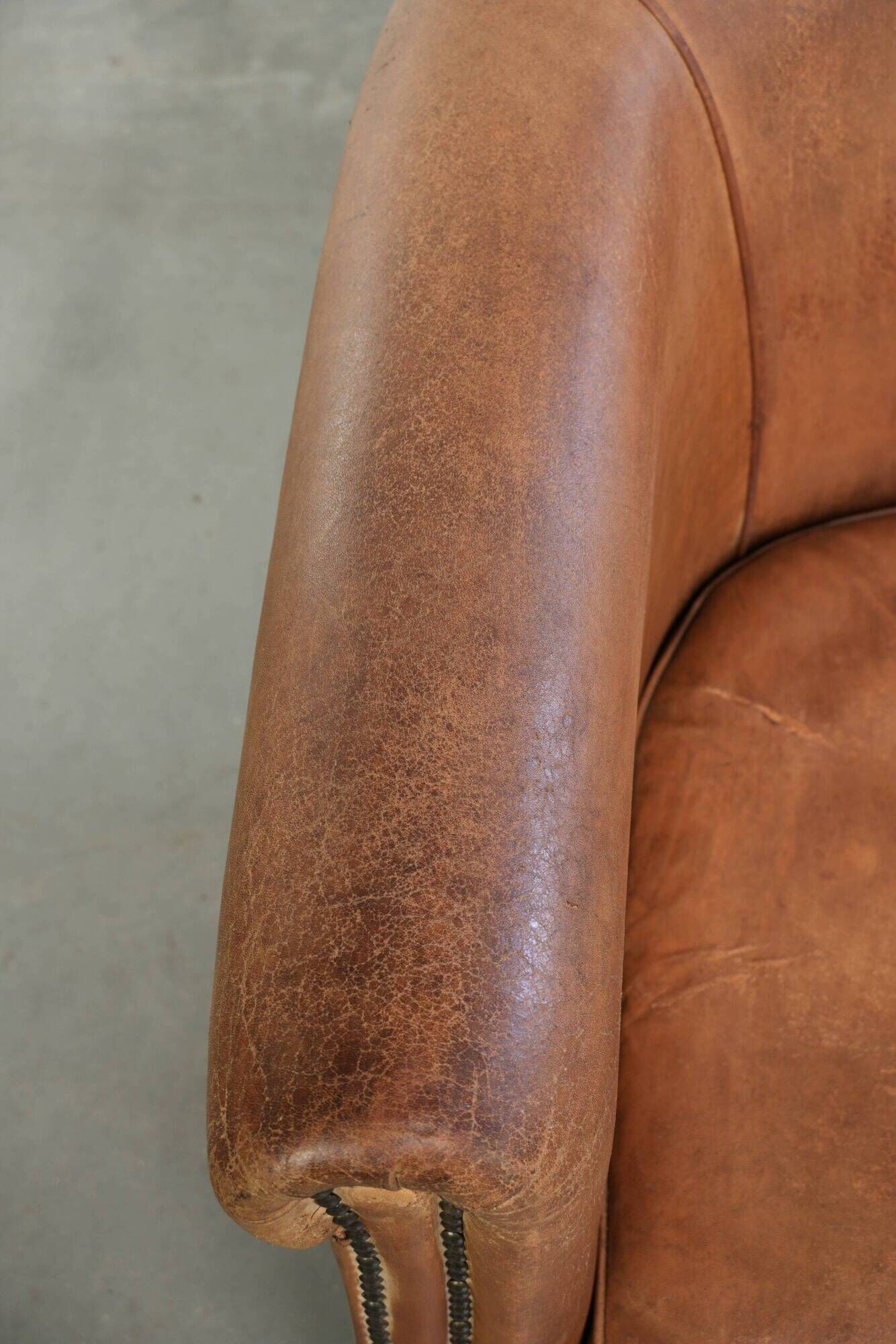 Vintage sheepskin club armchair in a beautiful light cognac colour