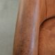 Vintage sheepskin club armchair in a beautiful light cognac colour