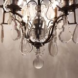 Neoclassical bronze chandelier with 8 lights, tassels and dagger