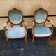 Paire de fauteuils medaillon de style Louis XVI