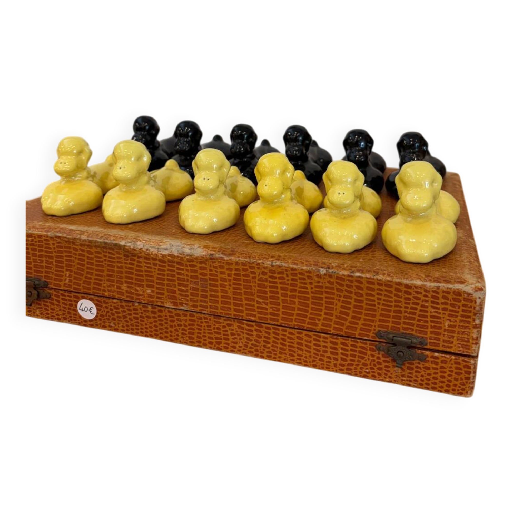Box of 12 dog-shaped cutlery rests in yellow and black majolica.