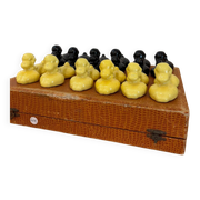Box of 12 dog-shaped cutlery rests in yellow and black majolica.
