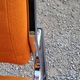 Pair of designer armchairs in orange fabrics and chrome tubes from the 70s