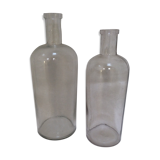 Pair of former pharmaceutical glass bottles