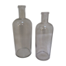 Pair of former pharmaceutical glass bottles