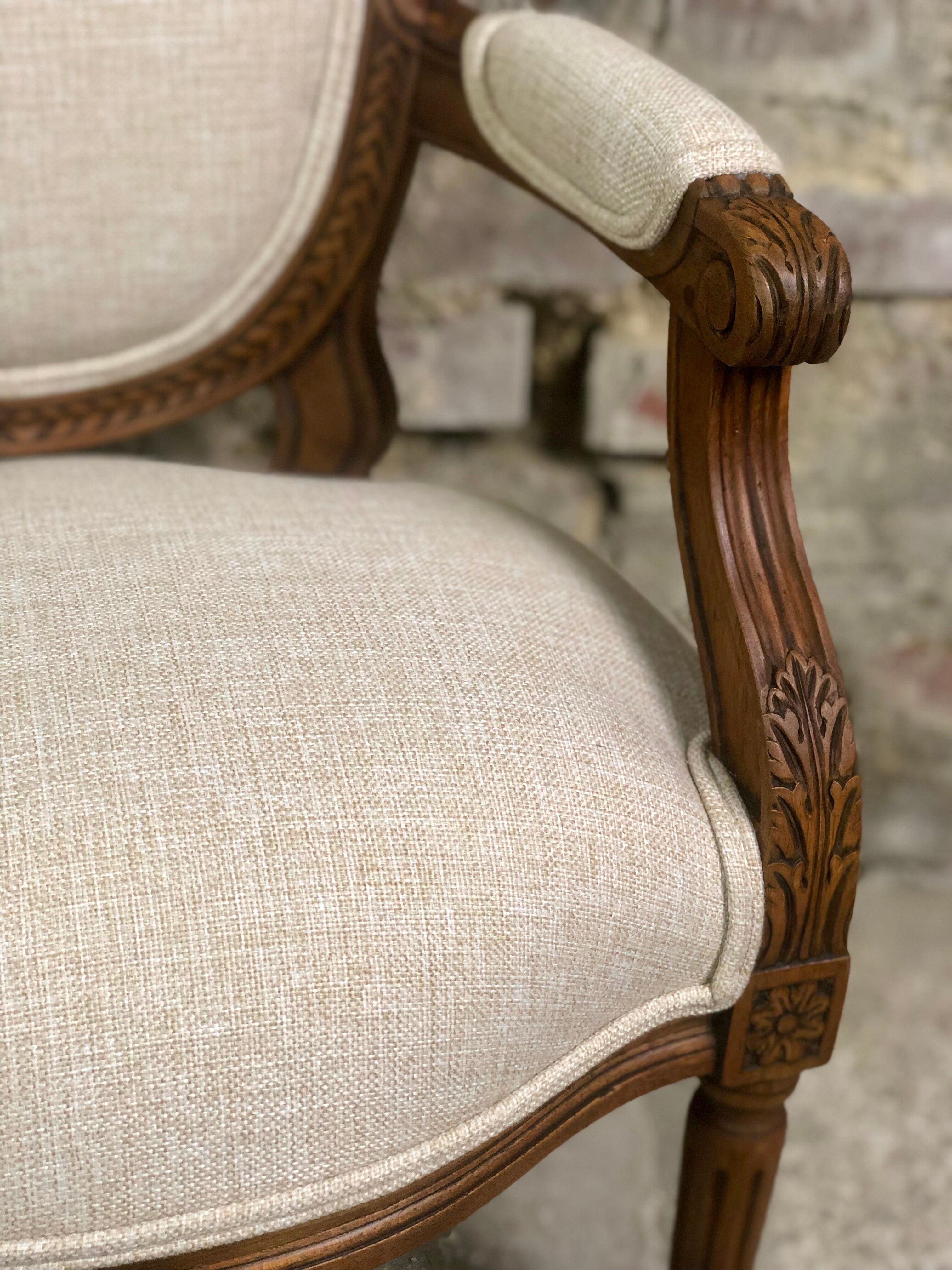 Louis XVI style children's armchair in carved walnut and beige antique upholstery