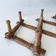 Old wooden wall coat rack