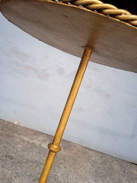 Minimalist brutalist gold metal pedestal table