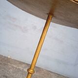 Minimalist brutalist gold metal pedestal table