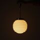 Suspension globe en opaline vert pale et doré