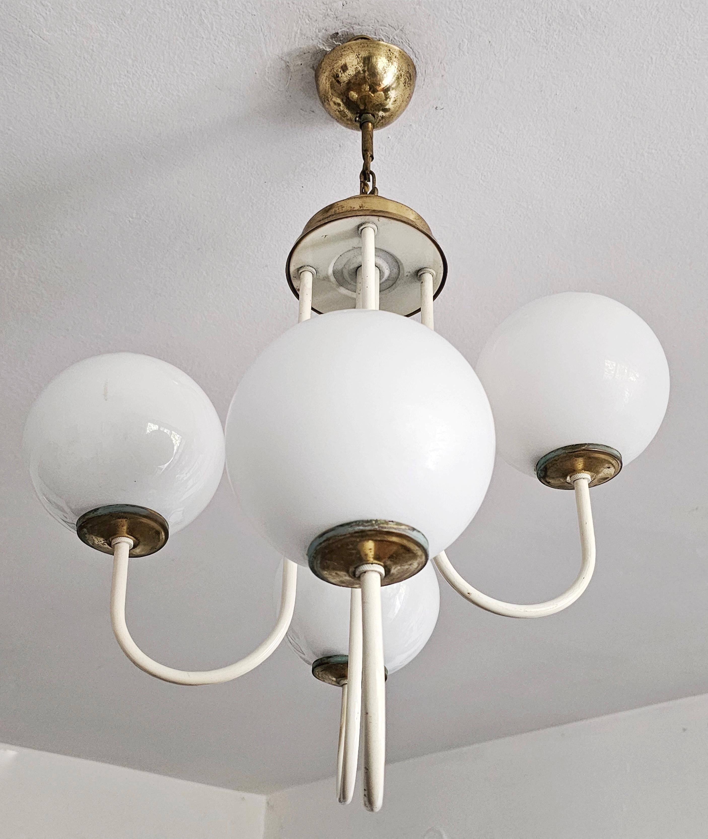 Mid-century modern chandelier with opaline glass balls.