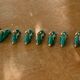 8 knife-wielding gazelles dabbling in green enamelled ceramic and vintage gold 1950