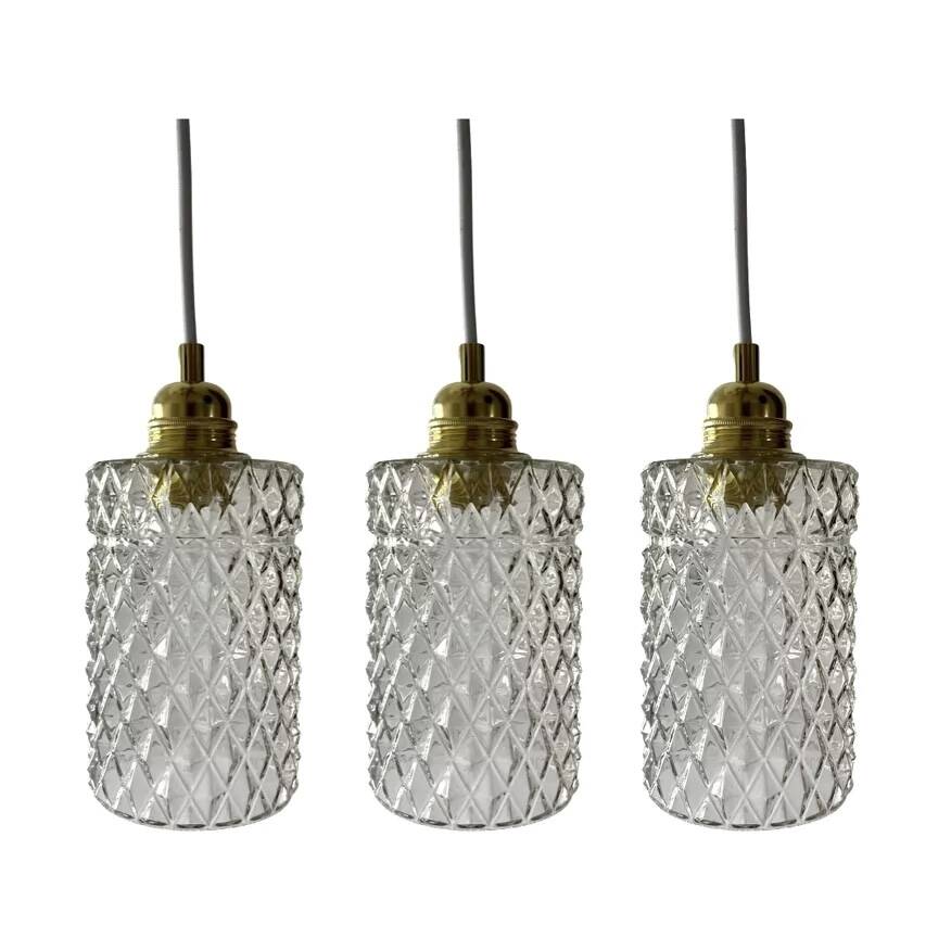 Set of three chiseled glass pendant lights of Scandinavian origin