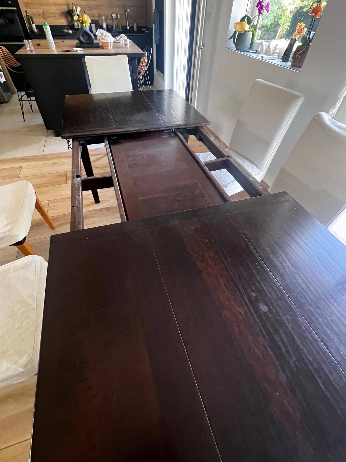 Solid cherry wood dining table, extendable for 8 to 12 people.