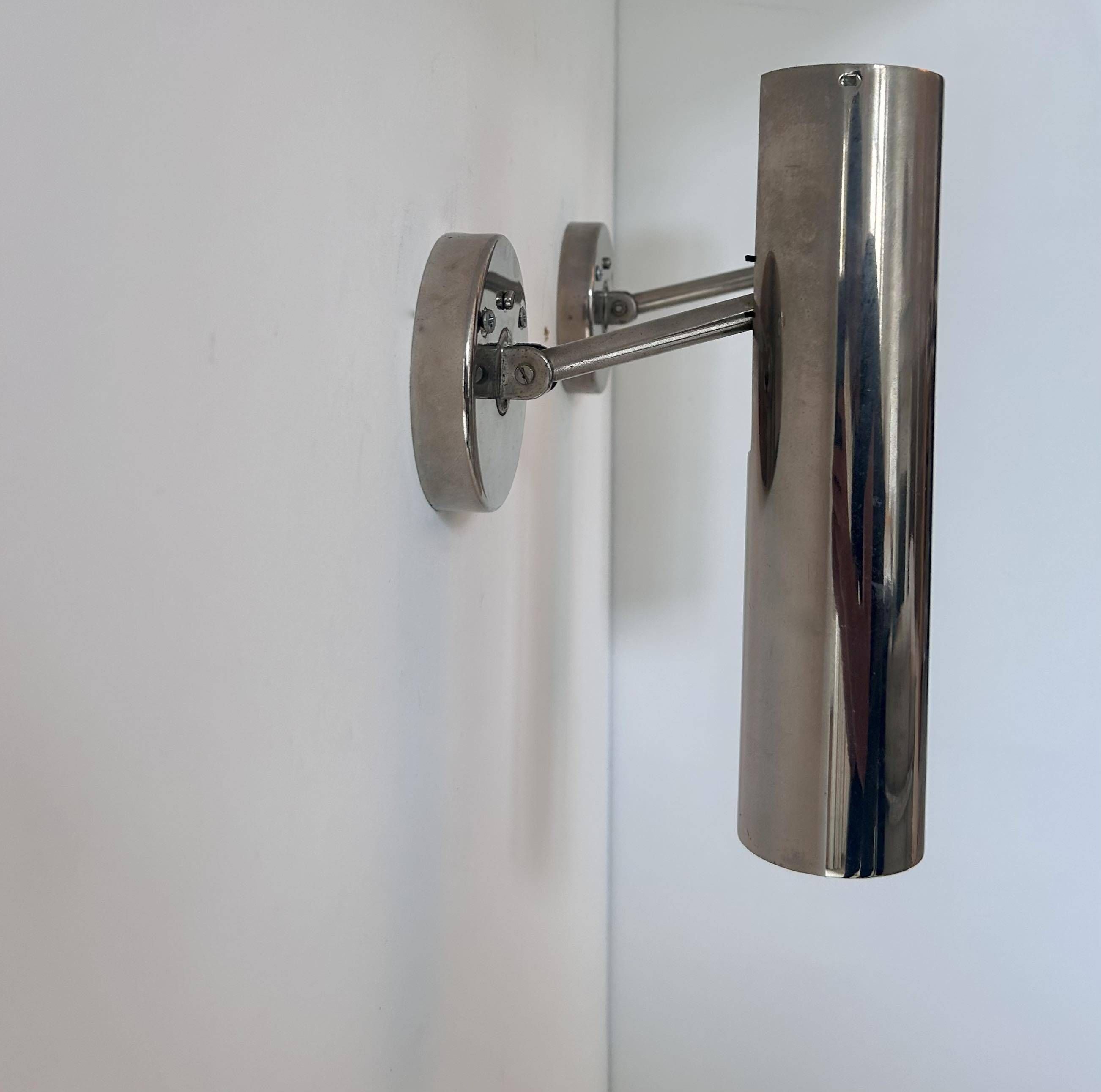 Pair of modernist adjustable wall lights, chrome metal, France 1960