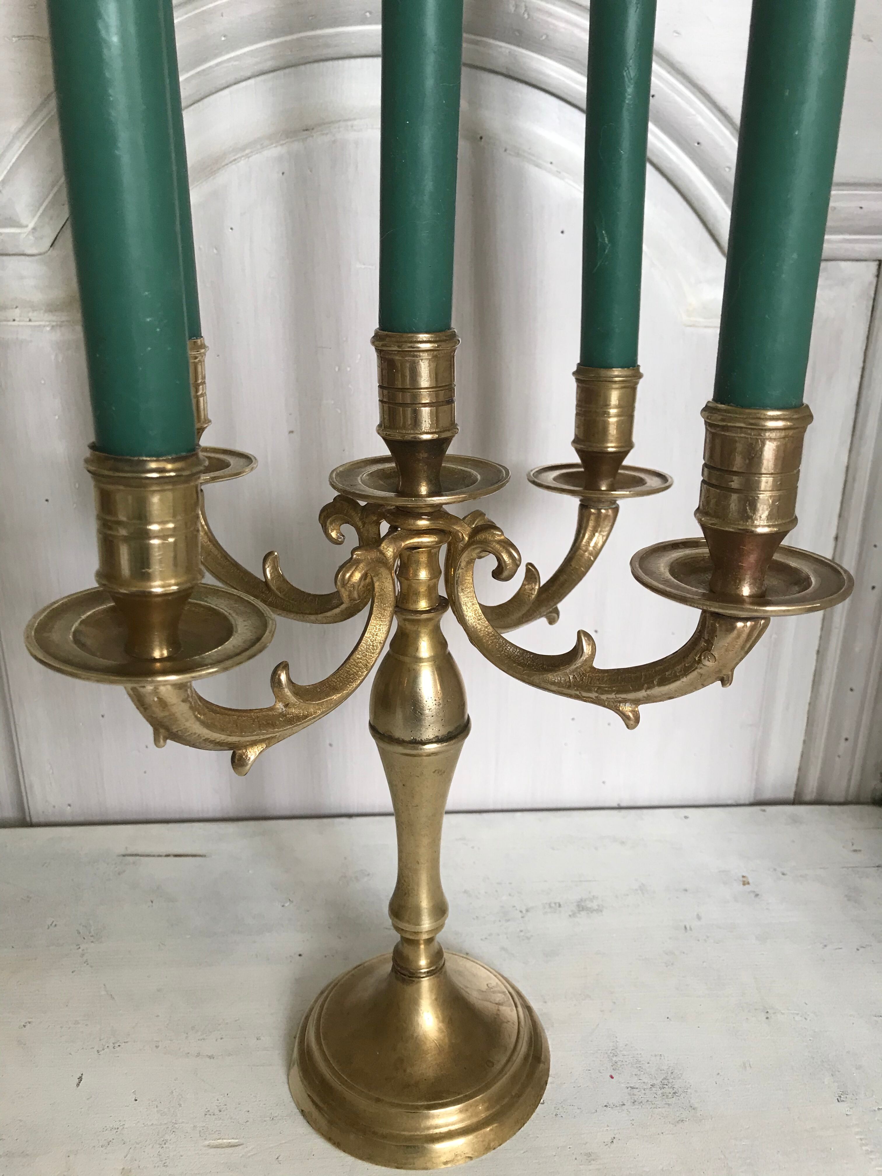 Ancient gilded bronze candlestick