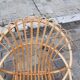 Pairs of shell rattan armchairs from the 50